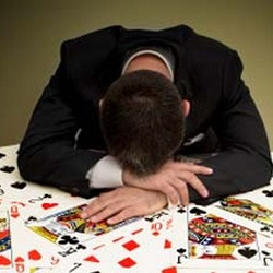 Businessman at Card Table